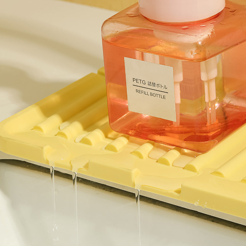 Height-increasing sloped drain pad faucet sink splash guard drain pad