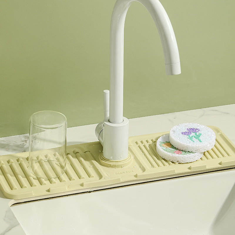 Height-increasing sloped drain pad faucet sink splash guard drain pad